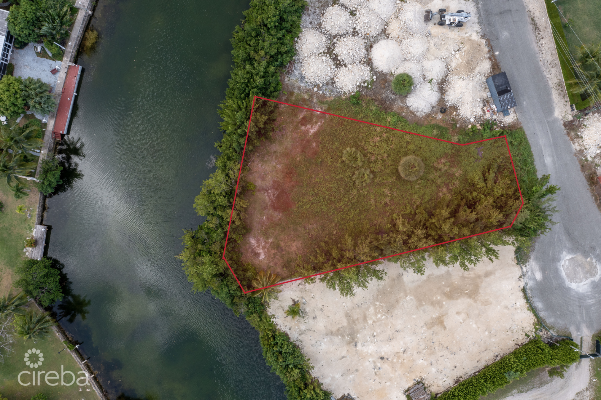 0.33 Acre Canal Front Land On Sweetleaf Close
