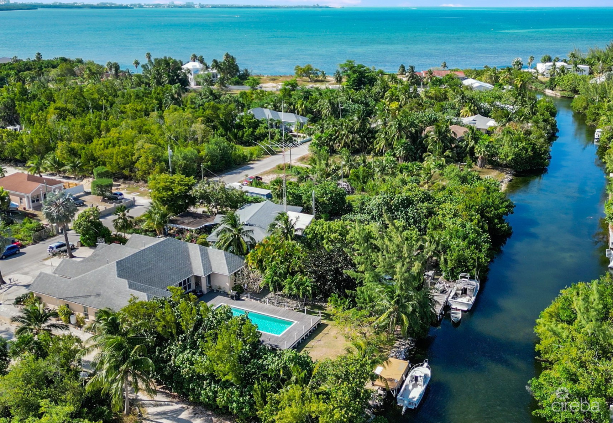 4,465 Sf Canal Front Duplex With Pool  (Both Sides - Or Individually)