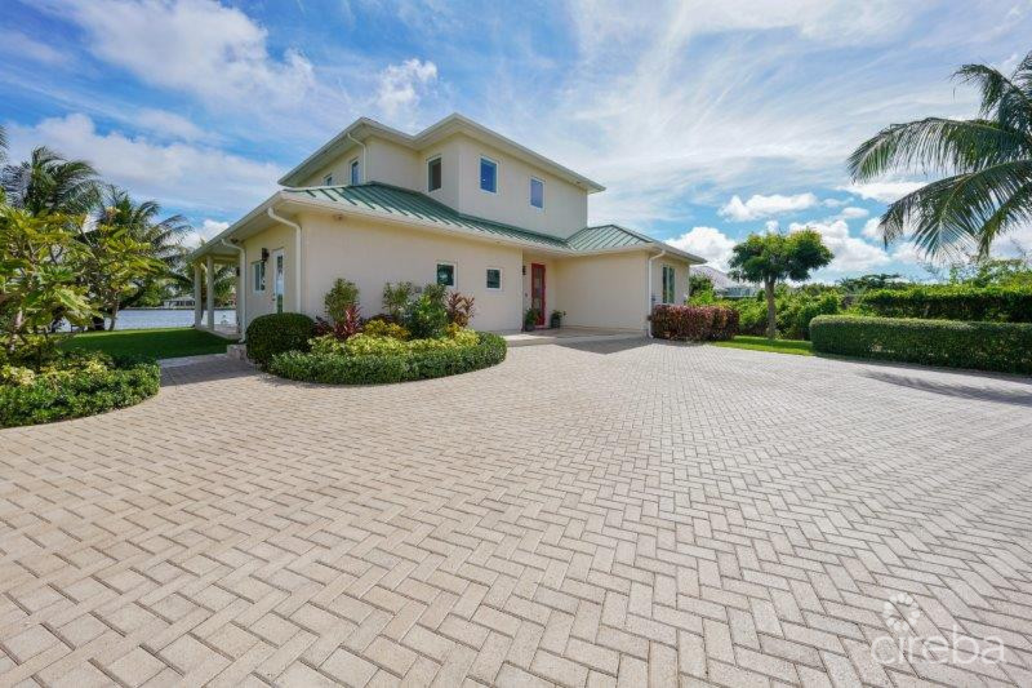 Unique Patrick’s Island Canal Front Home W Guest House And 3 Car Garage - Soon To Be Gated!